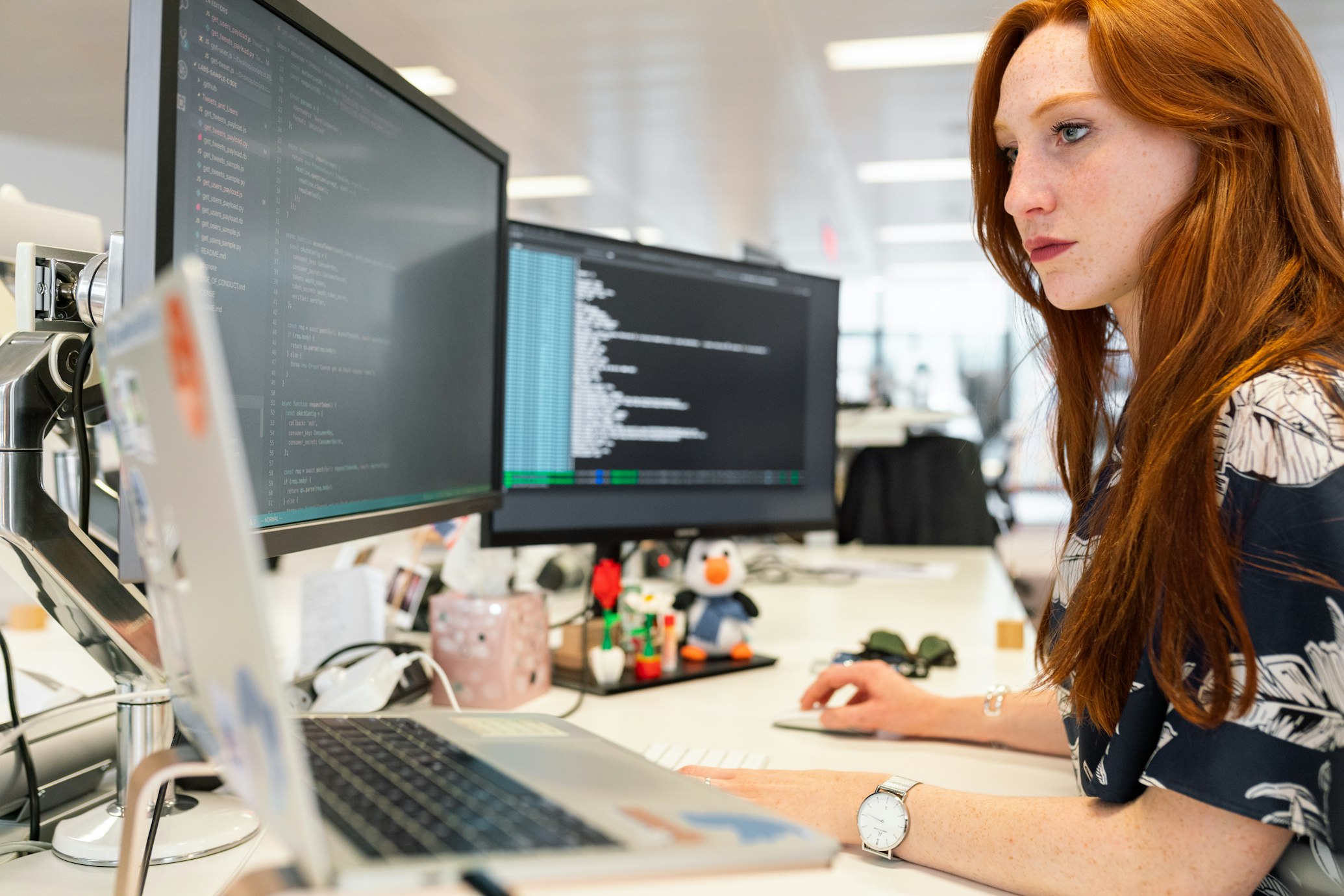 Developer with laptop working remotely - Join our network of elite developers